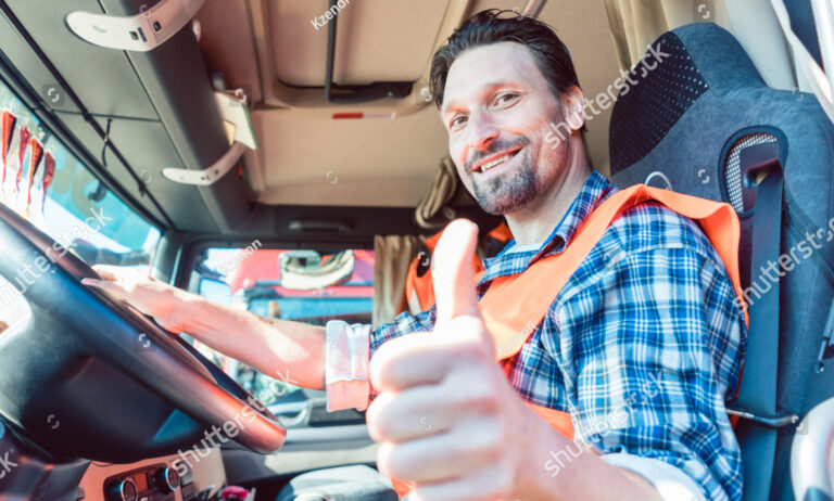 stock photo man in truck thumbs up
